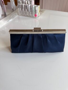 Jessica McClintock Navy Pleated Clutch with Silver Frame and chain for shoulder